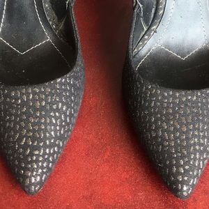 Black and gold heels